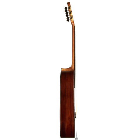The side of a 2024 Carlos Juan Busquiel classical guitar made with cedar and CSA rosewood shown on a white background
