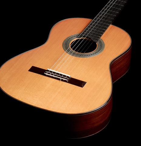 The soundboard and sides of a 2024 Carlos Juan Busquiel classical guitar made with cedar and CSA rosewood