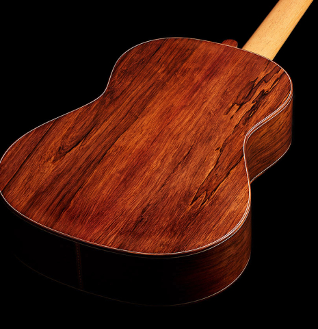 The back and sides of a 2024 Carlos Juan Busquiel classical guitar made with spruce and African rosewood