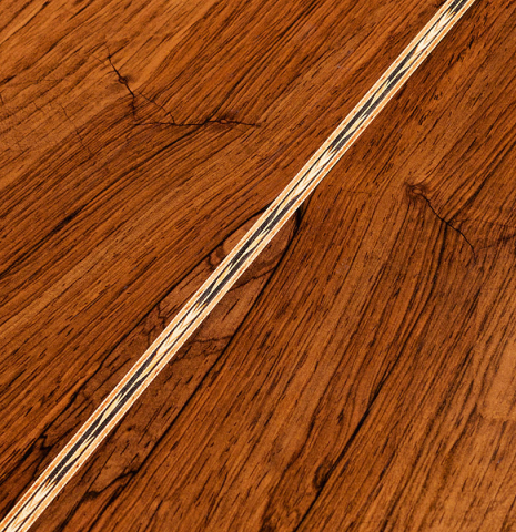 The back of a 2005 Gregory Byers classical guitar made with spruce and CSA rosewood