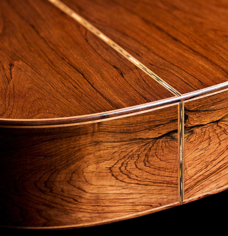 The back and sides of a 2005 Gregory Byers classical guitar made with spruce and CSA rosewood