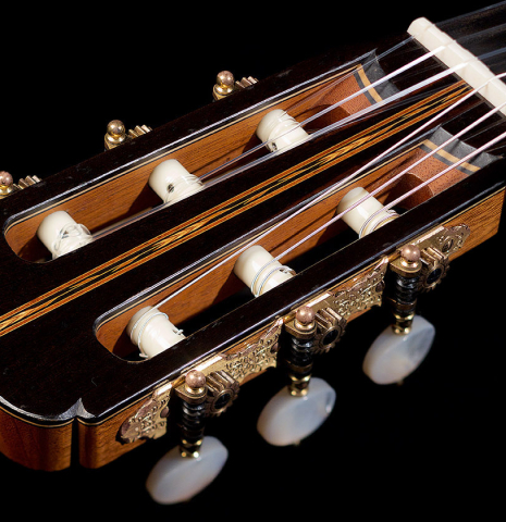 The headstock of a 2005 Gregory Byers classical guitar made with spruce and CSA rosewood