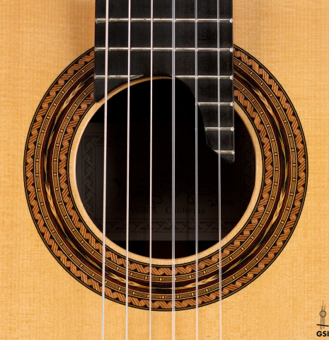 The rosette of a 2005 Gregory Byers classical guitar made with spruce and CSA rosewood