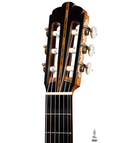 The headstock and tuners of a 2005 Gregory Byers classical guitar made with spruce and CSA rosewood