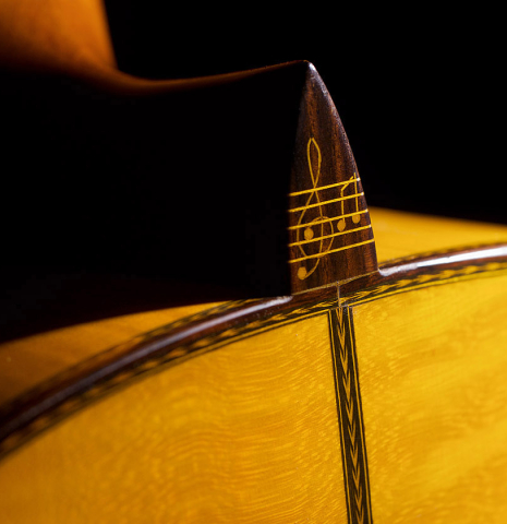 The ornamented heel of 1985 Javier Cayuela SP/MP classical guitar previously owned by Pepe Romero