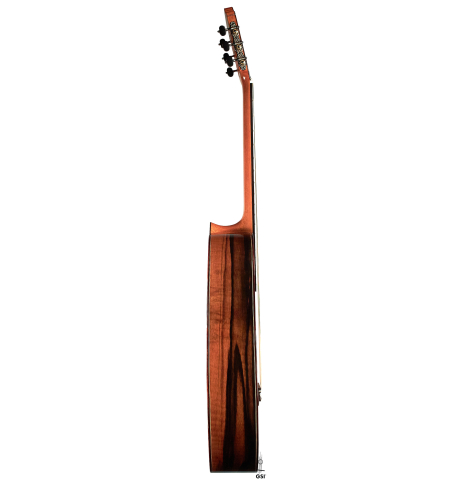 The side of a 2023 Hermanos Camps "CL20-S" classical guitar made of spruce and exotic ebony.