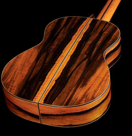 The back and sides at the foot of a 2024 Hermanos Camps "CL20-S" classical guitar made of spruce and exotic ebony