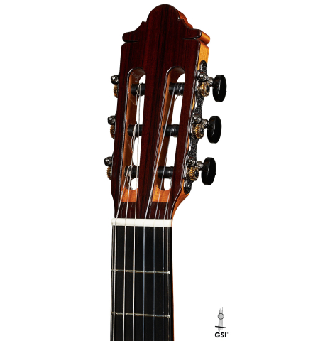 The headstock of a 2024 Hermanos Camps "CL20-S" classical guitar made of spruce and exotic ebony