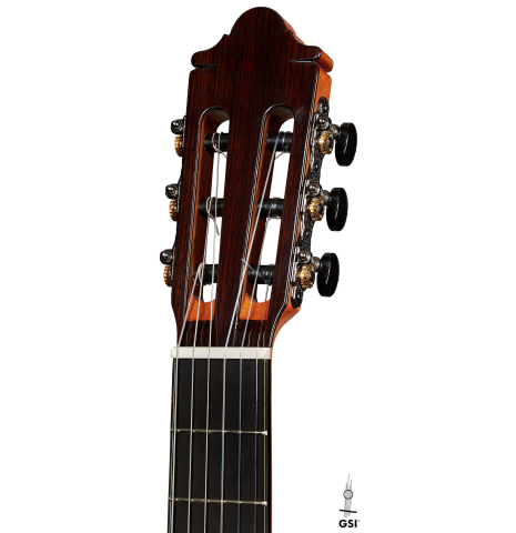 The headstock of a 2024 Hermanos Camps "CL20-S" classical guitar made of spruce and exotic ebony
