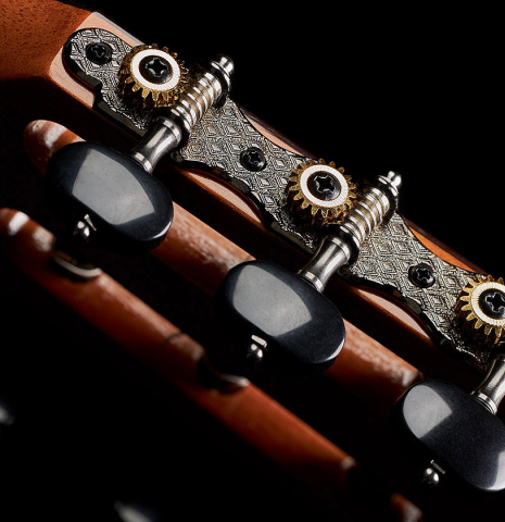 The headstock and tuning machines of a 2024 Hermanos Camps "CL20-S" classical guitar made of spruce and exotic ebony