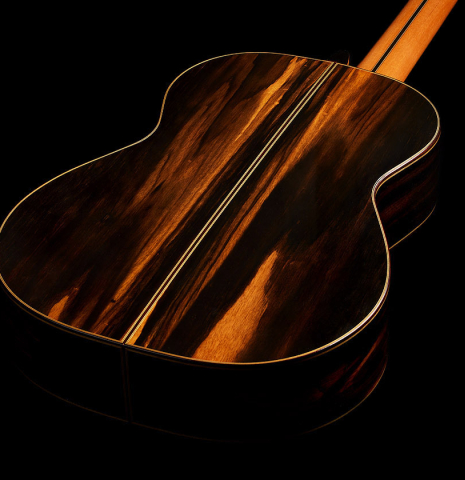 The back and sides of a 2024 Hermanos Camps "CL20-S" classical guitar made of spruce and exotic ebony