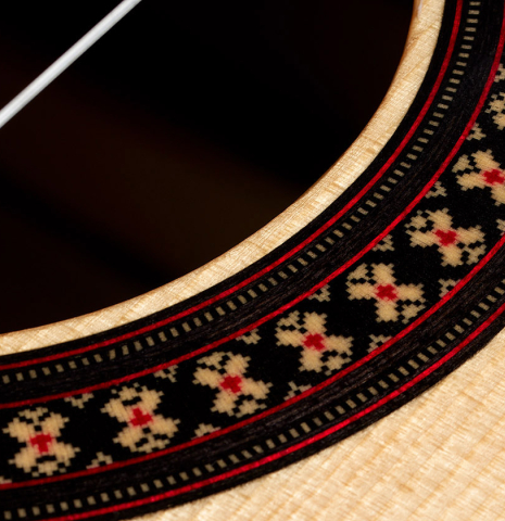Closeup detail of the rosette of a 2024 Hermanos Camps "CL20-S" classical guitar made of spruce and exotic ebony