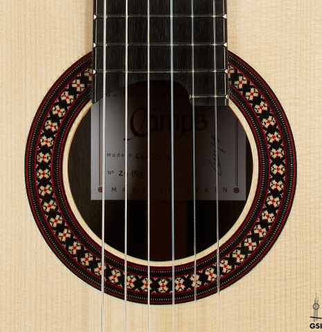 The rosette of a 2025 Hermanos Camps "CL20-S" classical guitar made of spruce and exotic ebony