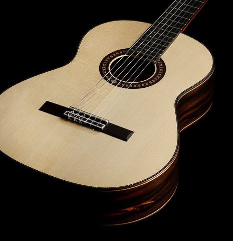 The top and sides of a 2025 Hermanos Camps "CL20-S" classical guitar made of spruce and exotic ebony