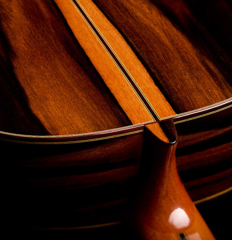 The heel, back binding and purfling of a 2026 Hermanos Camps "CL20-S" classical guitar made of spruce and exotic ebony