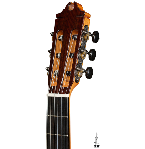 The headstock of a 2026 Hermanos Camps "CL20-S" classical guitar made of spruce and exotic ebony