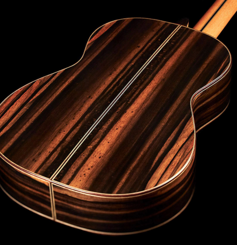 The back of a 2023 Hermanos Camps "CL20-C" classical guitar made of cedar and exotic ebony.