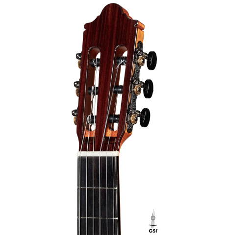 The headstock of a 2023 Hermanos Camps "CL20-C" classical guitar made of cedar and exotic ebony.
