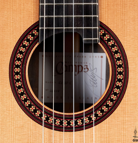 The rosette of a 2023 Hermanos Camps "CL20-C" classical guitar made of cedar and exotic ebony.