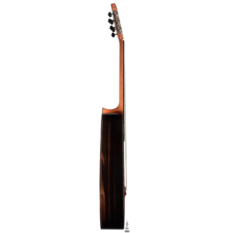 The side of a 2023 Hermanos Camps "CL20-C" classical guitar made of cedar and exotic ebony.
