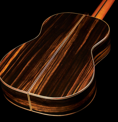 The back and sides at the foot of a 2023 Hermanos Camps "CL20-C" classical guitar made of cedar and exotic ebony