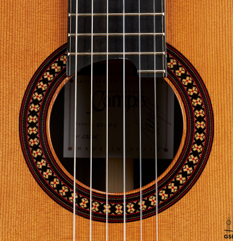 The rosette of a 2023 Hermanos Camps "CL20-C" classical guitar made of cedar and exotic ebony