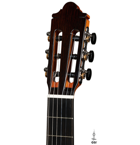 The headstock of a 2024 Hermanos Camps "CL20-C" classical guitar made of cedar and exotic ebony