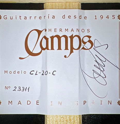 The label of a 2024 Hermanos Camps "CL20-C" classical guitar made of cedar and exotic ebony