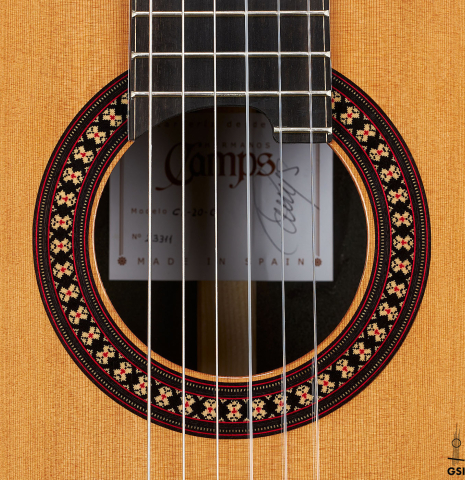 The rosette of a 2024 Hermanos Camps "CL20-C" classical guitar made of cedar and exotic ebony