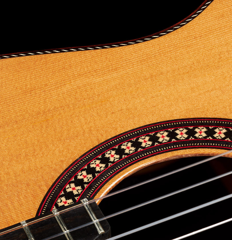 Detail of the rosette of a 2024 Hermanos Camps "CL20-C" classical guitar made of cedar and exotic ebony