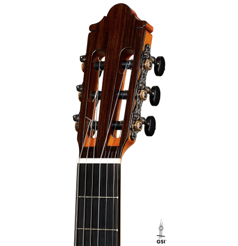 The headstock of a 2024 Hermanos Camps "CL20-C" classical guitar made of cedar and exotic ebony