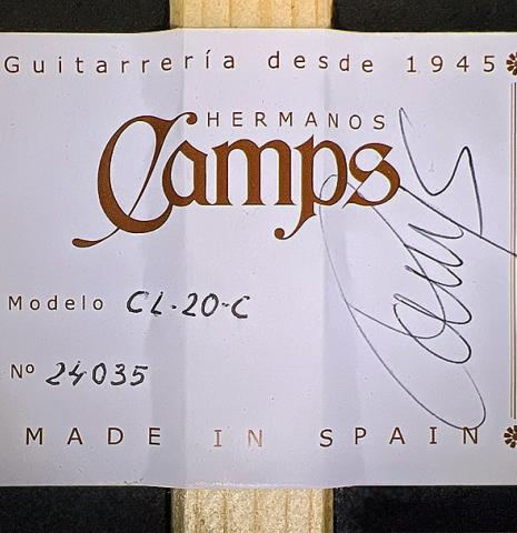The label of a 2024 Hermanos Camps "CL20-C" classical guitar made of cedar and exotic ebony