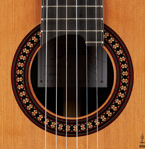 The rosette of a 2024 Hermanos Camps "CL20-C" classical guitar made of cedar and exotic ebony