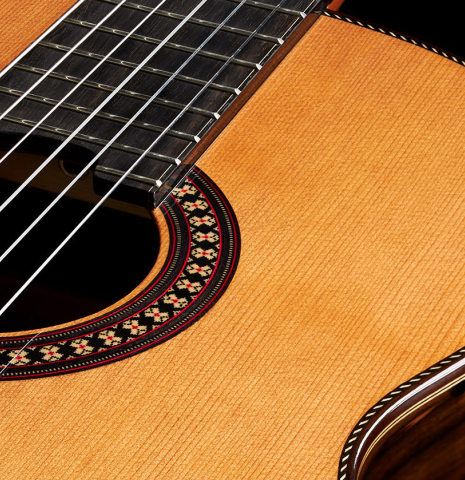 Detail of the rosette of a 2024 Hermanos Camps "CL20-C" classical guitar made of cedar and exotic ebony