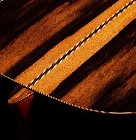 The heel, back bindings and purflings of a 2024 Hermanos Camps "CL20-C" classical guitar made of cedar and exotic ebony