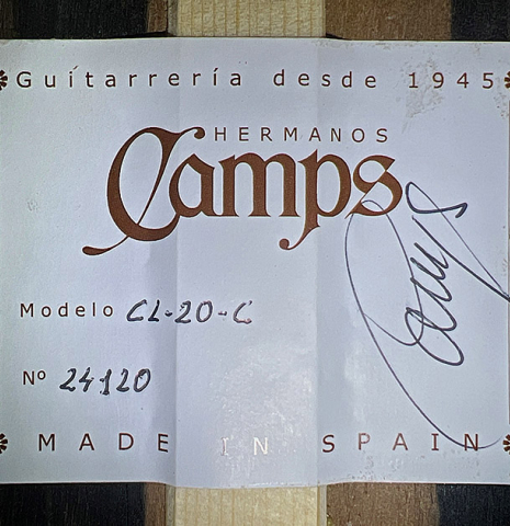 The label of a 2024 Hermanos Camps "CL20-C" classical guitar made of cedar and exotic ebony