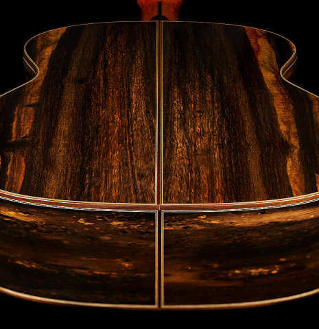 The back and sides at the foot of a 2025 Hermanos Camps "CL20-C" classical guitar made of cedar and exotic ebony