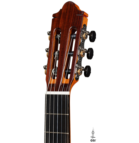 The headstock of a 2025 Hermanos Camps "CL20-C" classical guitar made of cedar and exotic ebony
