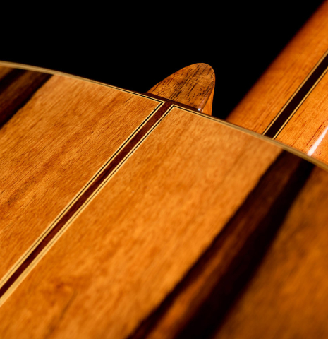 The heel, back binding and purfling of a 2025 Hermanos Camps "CL20-C" classical guitar made of cedar and exotic ebony