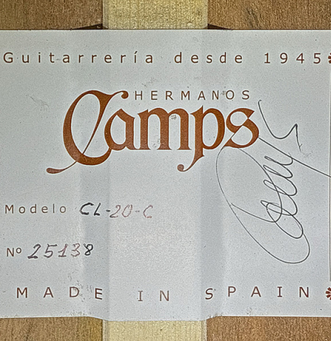 The label of a 2025 Hermanos Camps "CL20-C" classical guitar made of cedar and exotic ebony
