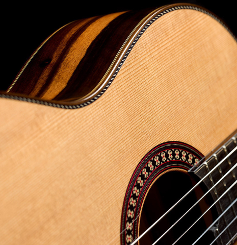 The soundboard, side and rosette of a 2025 Hermanos Camps "CL20-C" classical guitar made of cedar and exotic ebony