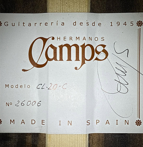 The label of a 2026 Hermanos Camps "CL20-C" classical guitar made of cedar and exotic ebony