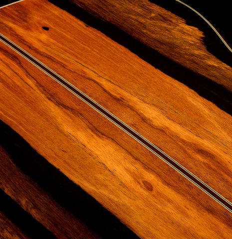 The back center seam of a 2026 Hermanos Camps "CL20-C" classical guitar made of cedar and exotic ebony