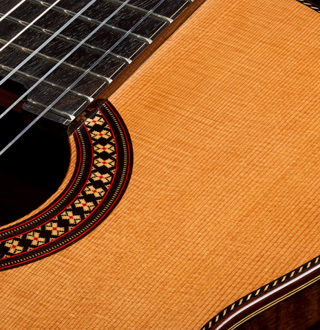 The soundboard, side and rosette of a 2026 Hermanos Camps "CL20-C" classical guitar made of cedar and exotic ebony