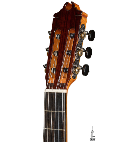 The headstock of a 2026 Hermanos Camps "CL20-C" classical guitar made of cedar and exotic ebony