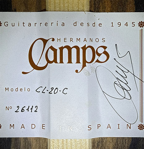 The label of a 2026 Hermanos Camps "CL20-C" classical guitar made of cedar and exotic ebony