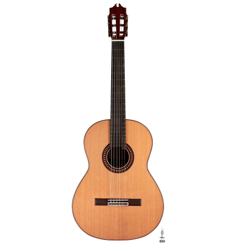 The front of a 2023 Hermanos Camps "GL18C" classical guitar made with cedar and Indian rosewood.