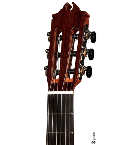 The headstock of a 2023 Hermanos Camps "GL18C" classical guitar made with cedar and Indian rosewood.
