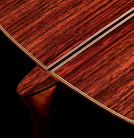 The heel of a 2023 Hermanos Camps "GL18C" classical guitar made with cedar and Indian rosewood.