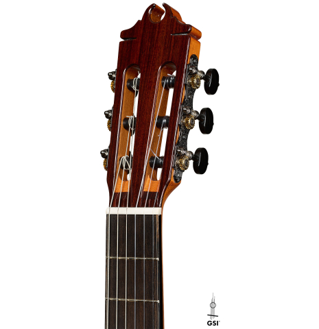 The headstock of a Hermanos Camps "CL18C" classical guitar made of cedar and Indian rosewood